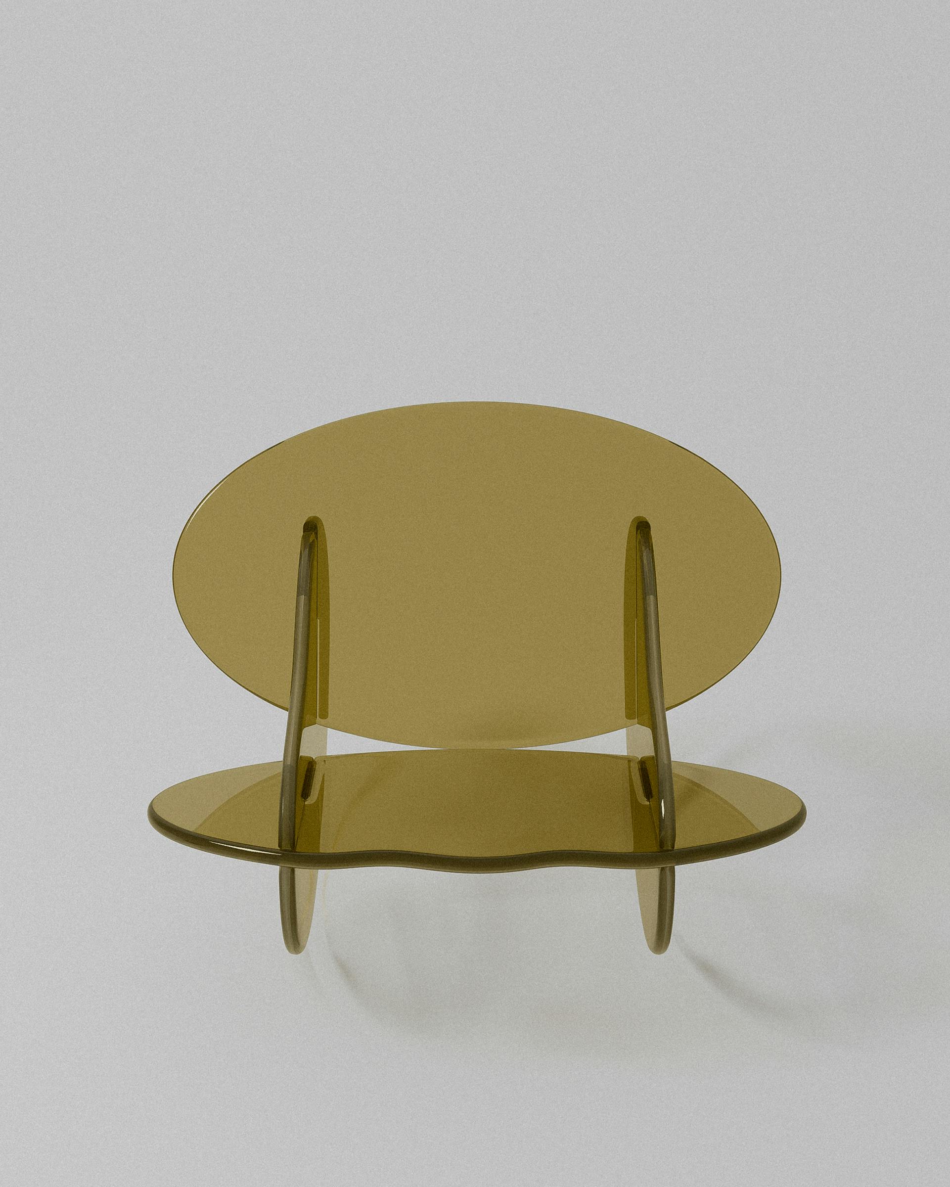 Rocker acrylic chair – Translucent amber chair, oval back, wavy seat. | MUÑIZ Miami